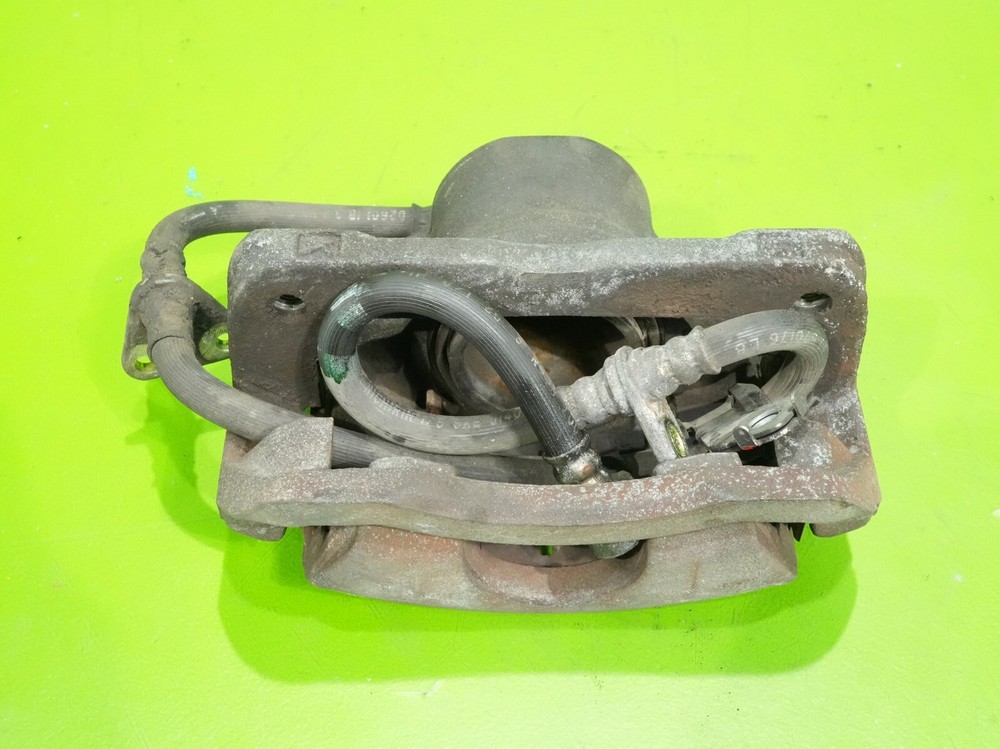 90-93 Integra OEM driver left front brake caliper + slide assembly