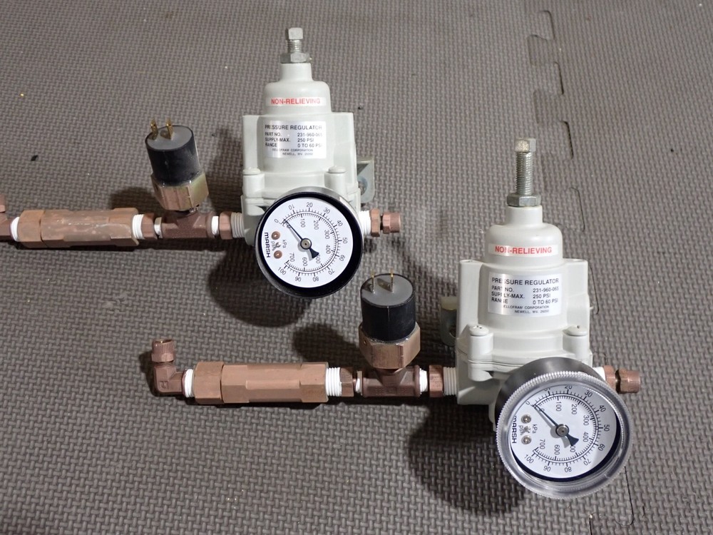 Gas flow regulators and desiccant