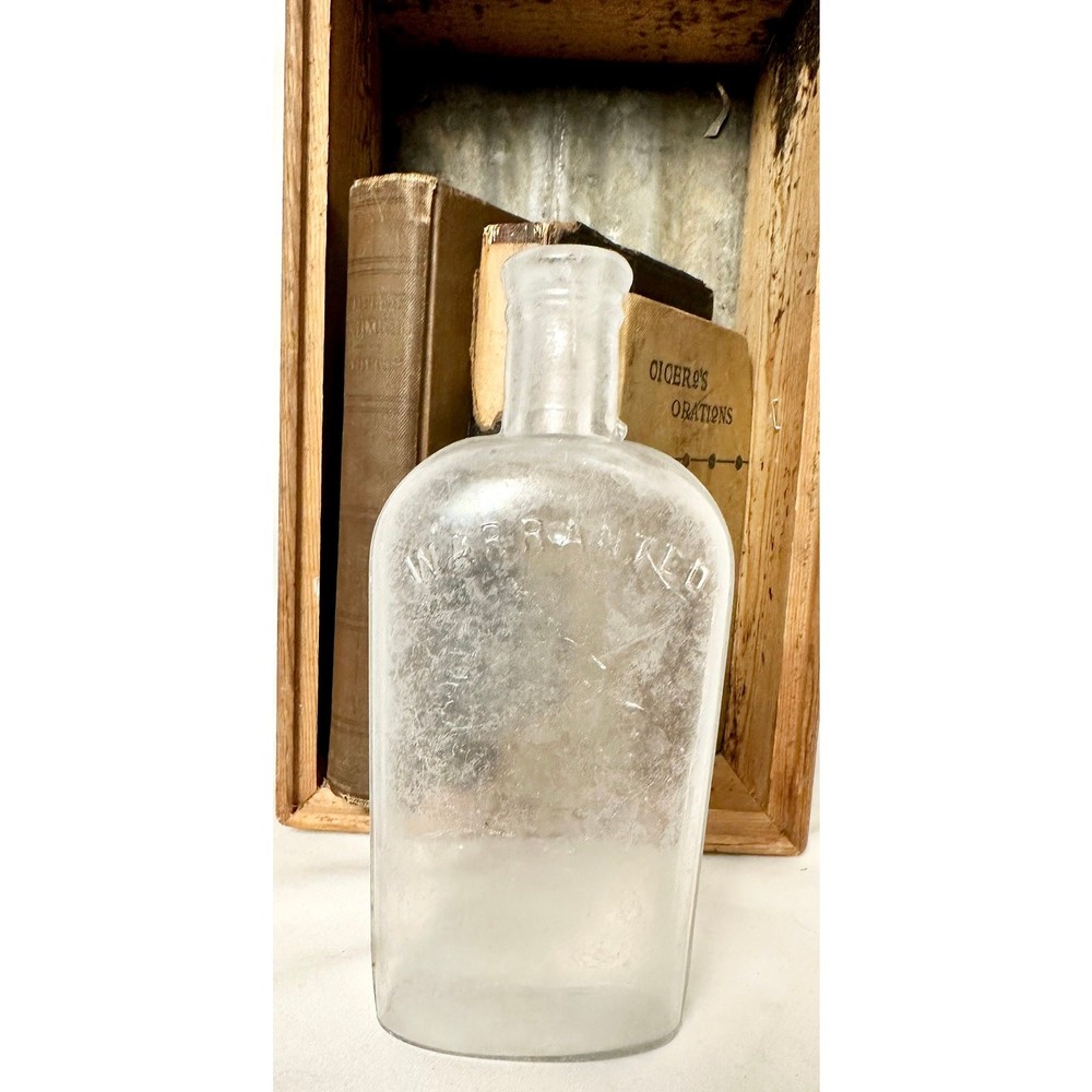 Vintage WARRANTED Bottle