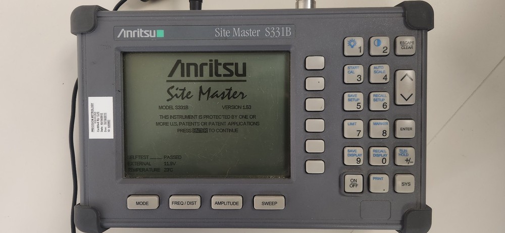 Anritsu S331B Site Master with power supply.