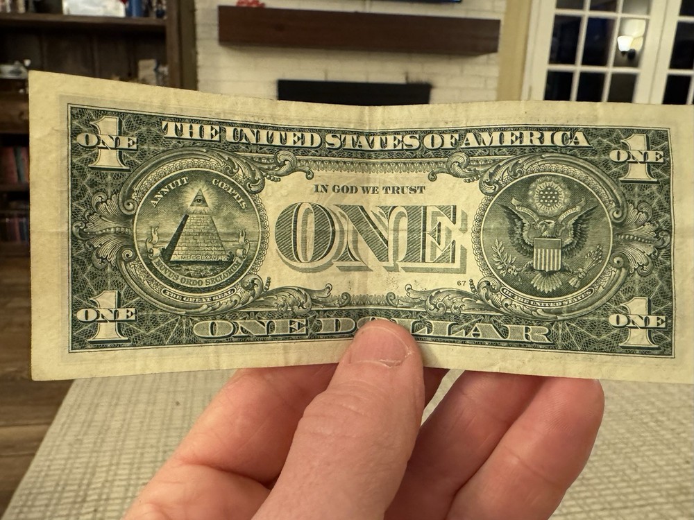 67 One Dollar Bill