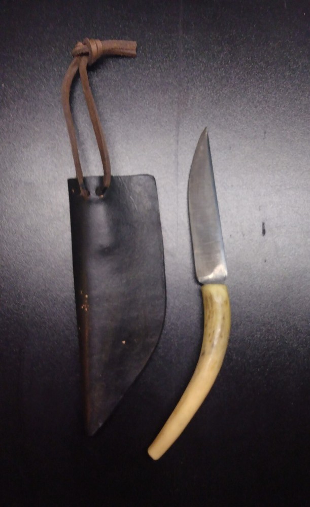 Unique handmade 8" knife in leather sheath