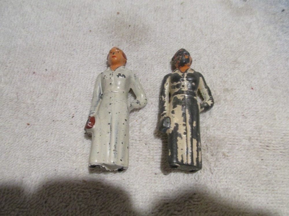 CAST IRON NURSES 2.75 INCHES TALL