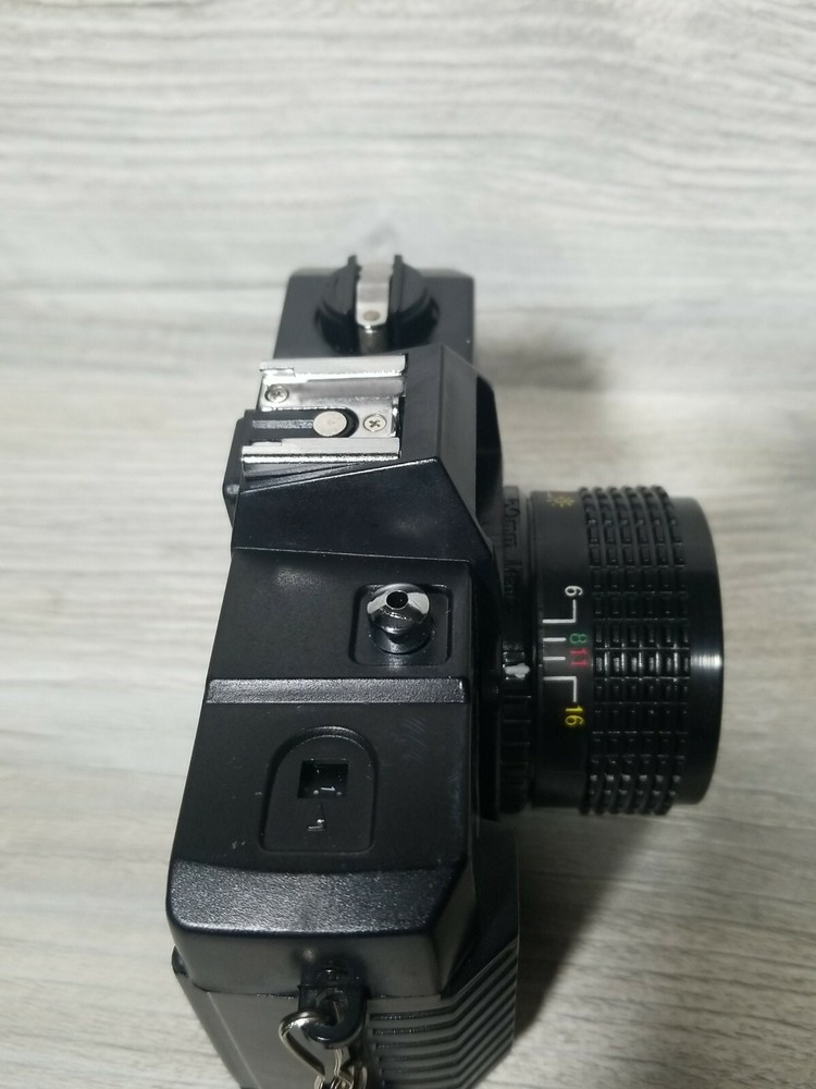 Vac 35MM Camera with Handstrap, Carrying Case, and Lens Cap