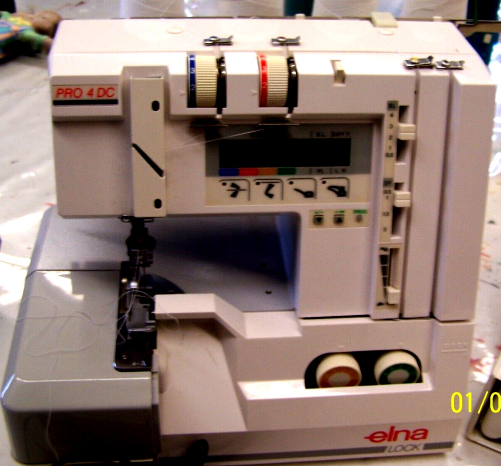used    Elna Lock Pro 4 DC Overlock Serger Machine plus Accessories  powers up