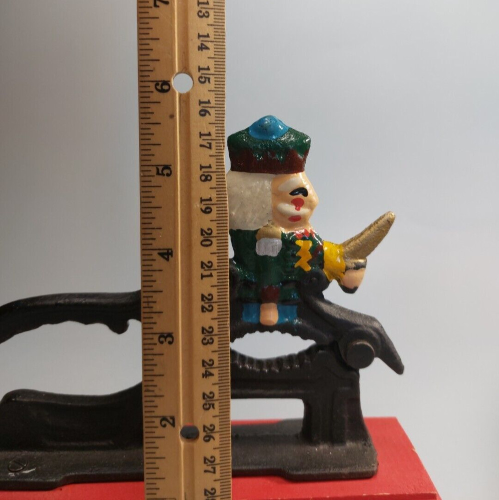 Cast Iron Painted Soldier Nut Cracker on wood base