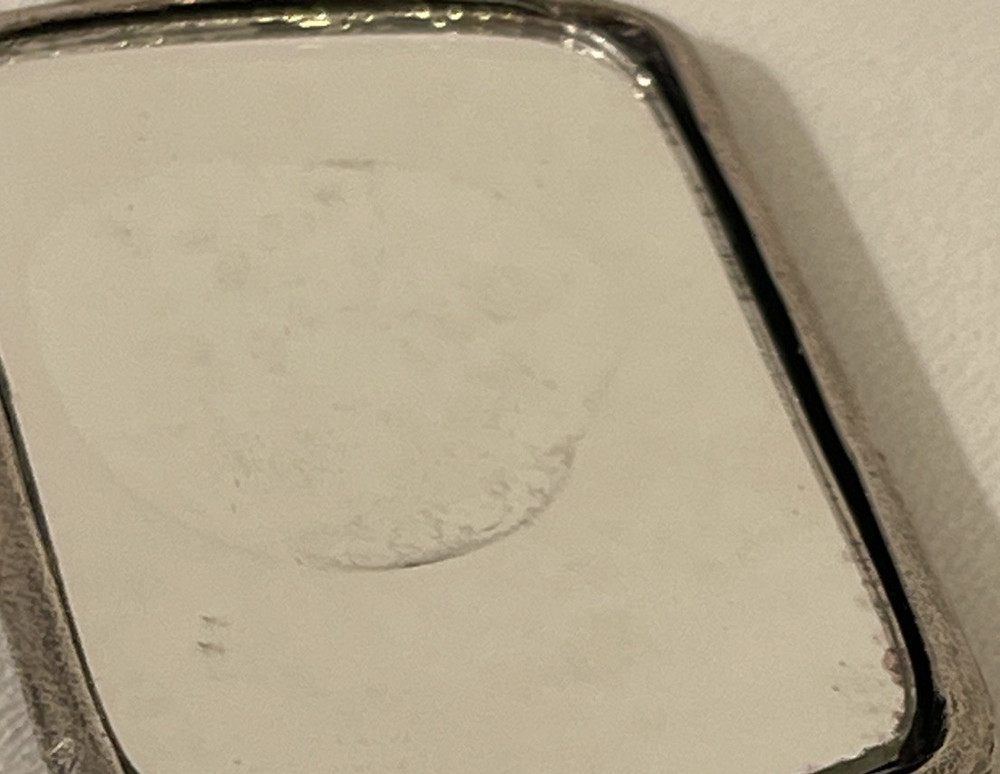 Small cast metal vintage vanity mirror