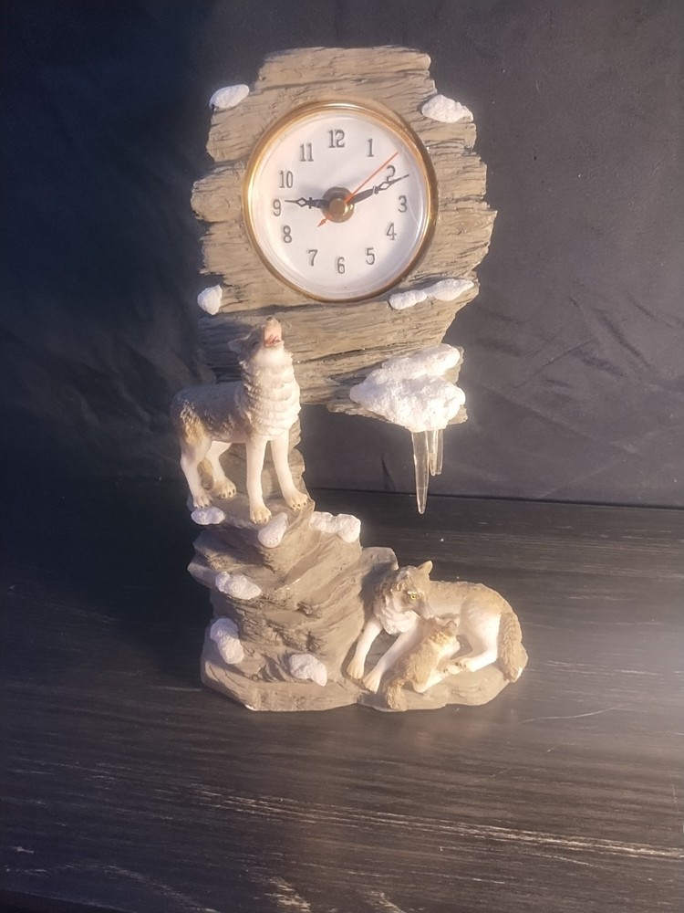 wolf clock missing ear and ice
