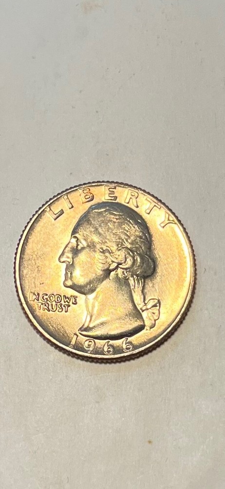 1966 Washington Quarter — copper showing on obverse