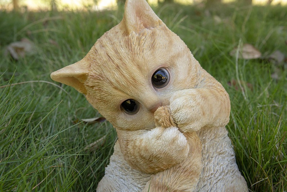 Hi-Line Gift Ltd. Orange Tabby Kitten Playing with Tail