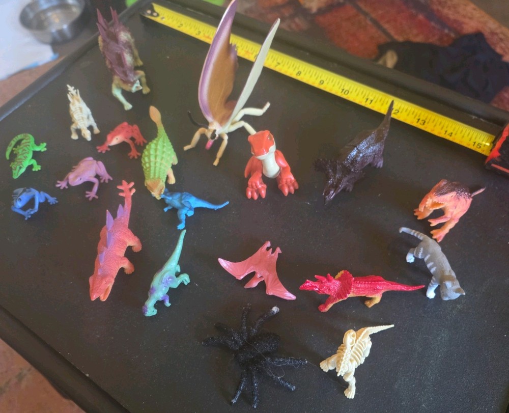 Plastic toy dinosaurs and animals