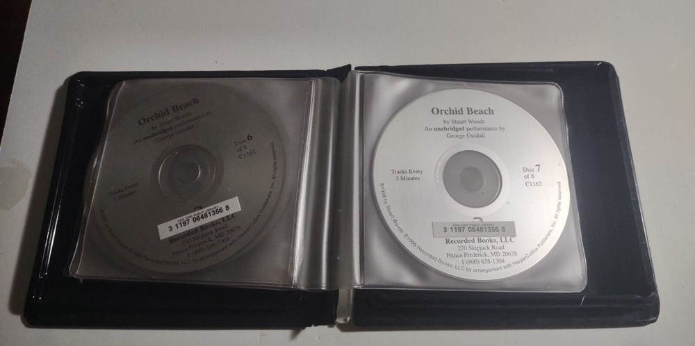 Orchid Beach by Stuart Woods. 7 Compact Discs. Missing Disc 8.