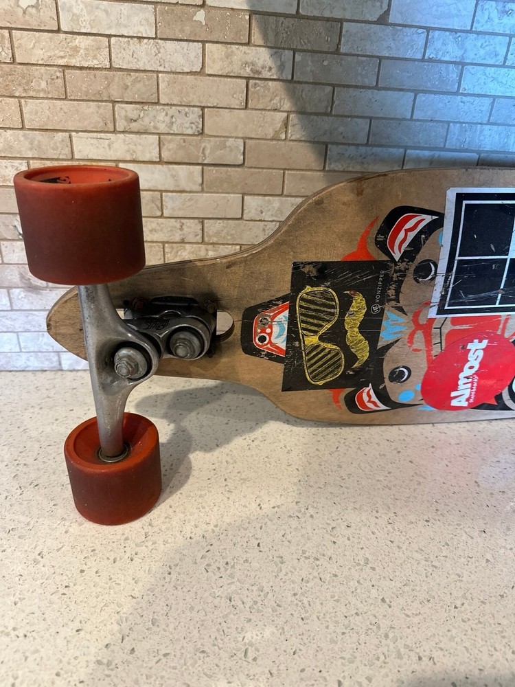 Catalyst longboard with gull wing trucks
