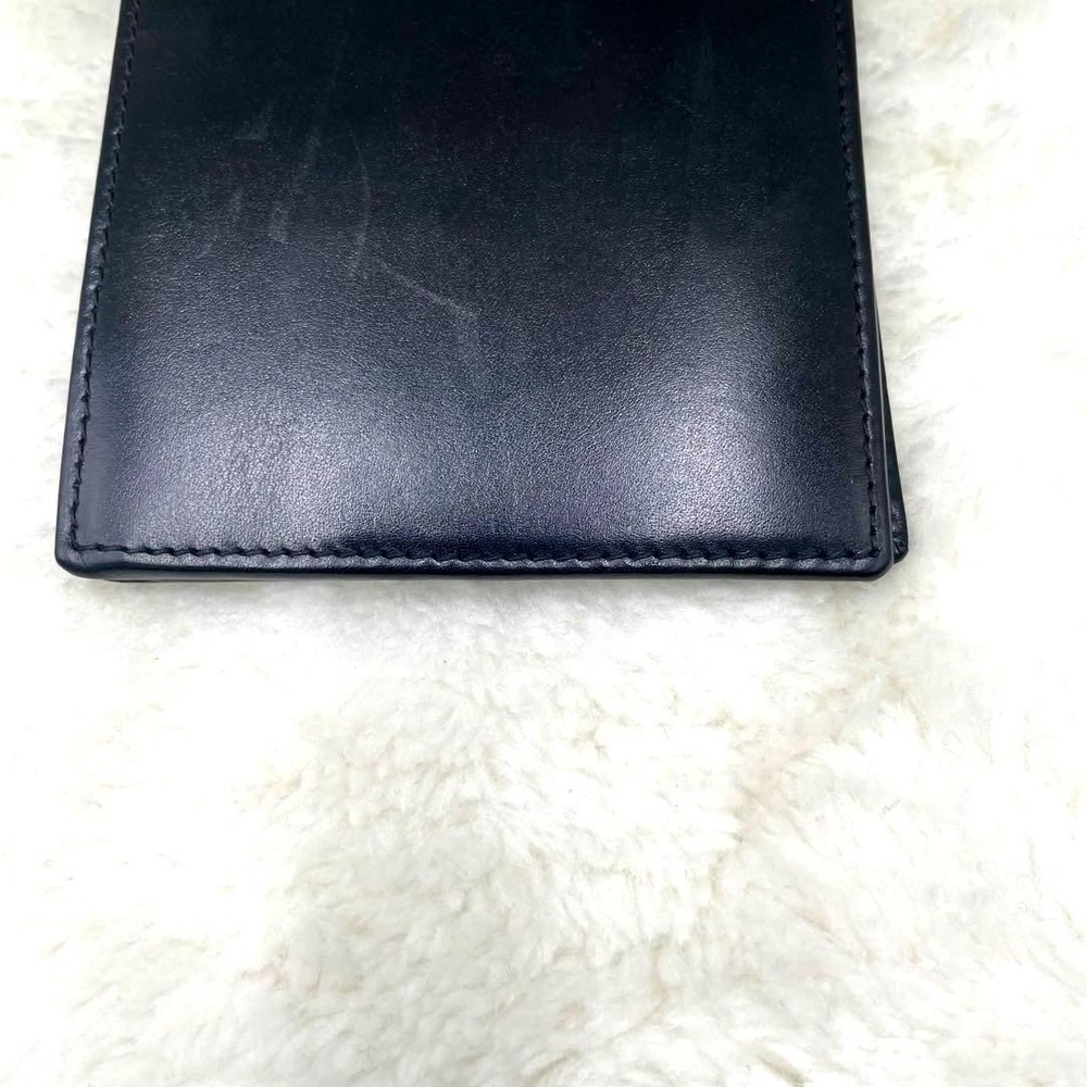 GUCCI Embossed Logo Black Folding Wallet