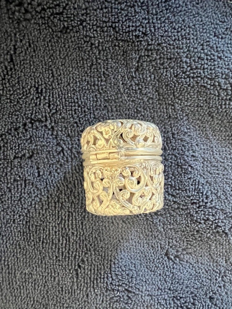 Sterling silver thimble holder