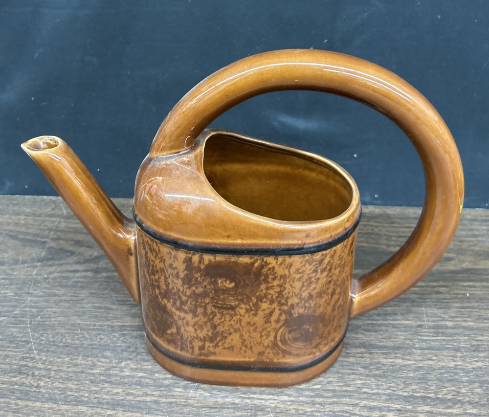 Multi shade brown ceramic circular handle decorative planter  9"h., 11 1/2"w