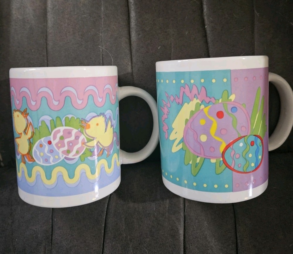 Easter themed ceramic mug set featuring pastel chicks and decorated eggs