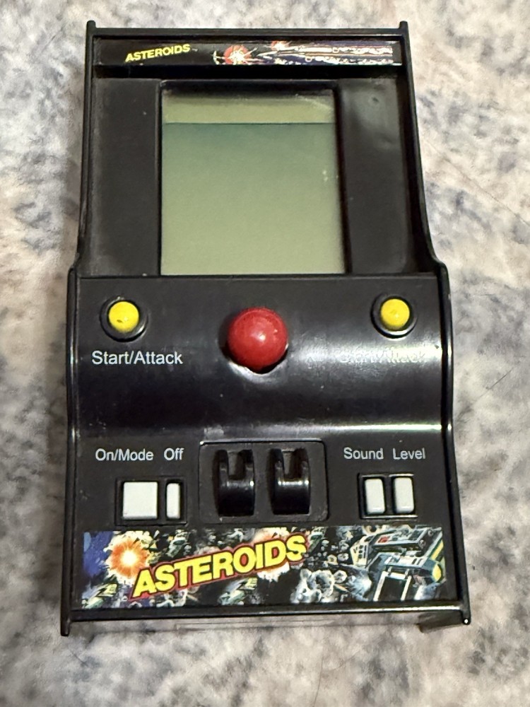 Asteroids Handheld Electronic Mini Arcade Game 2005 Atari MGA 5”