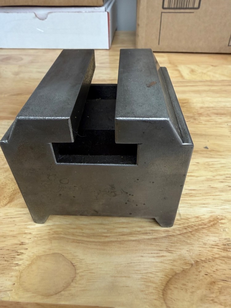 Slotted steel riser block