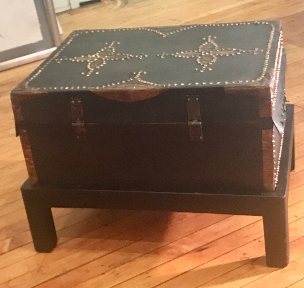 antique trunks chests on a custom stand