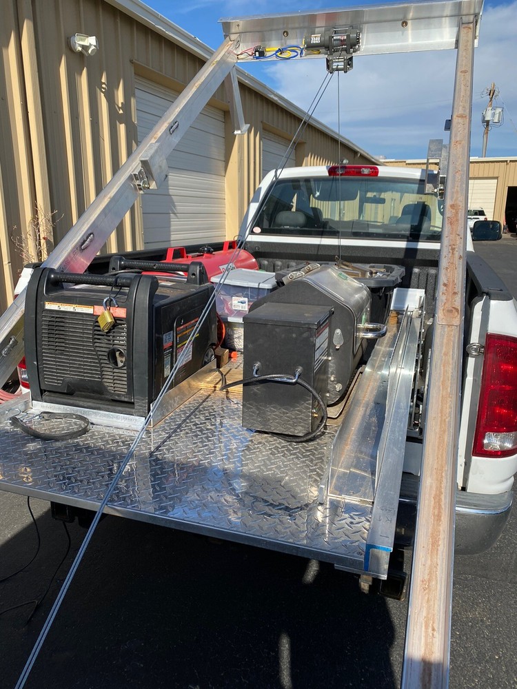 RAZOR LOADER FOR PICKUP TRUCK WITH IN BED STORAGE AND PULL AN RV