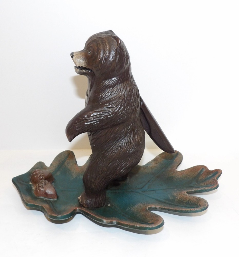 WONDERFUL M.I. CAST IRON BEAR STANDING ON LEAF NUTCRACKER