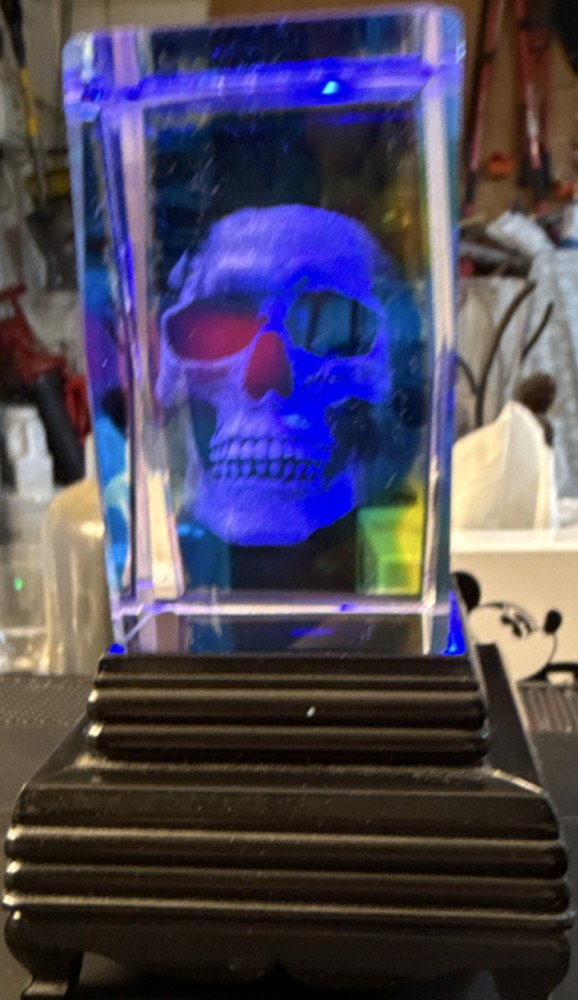 Illuminated Skull Glass Display with Color Changing Lights on Black Base