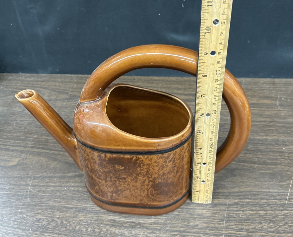 Multi shade brown ceramic circular handle decorative planter 9"h., 11 1/2"w