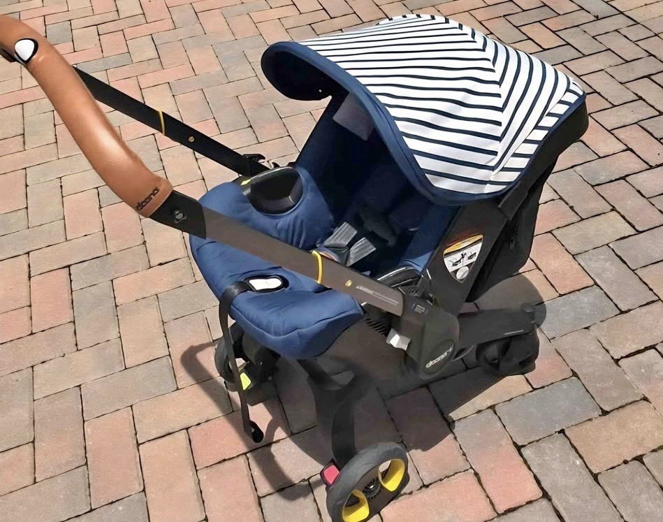 Doona Car Seat Stroller Navy Stripe Folding Adjustable Handle Yellow Wheels