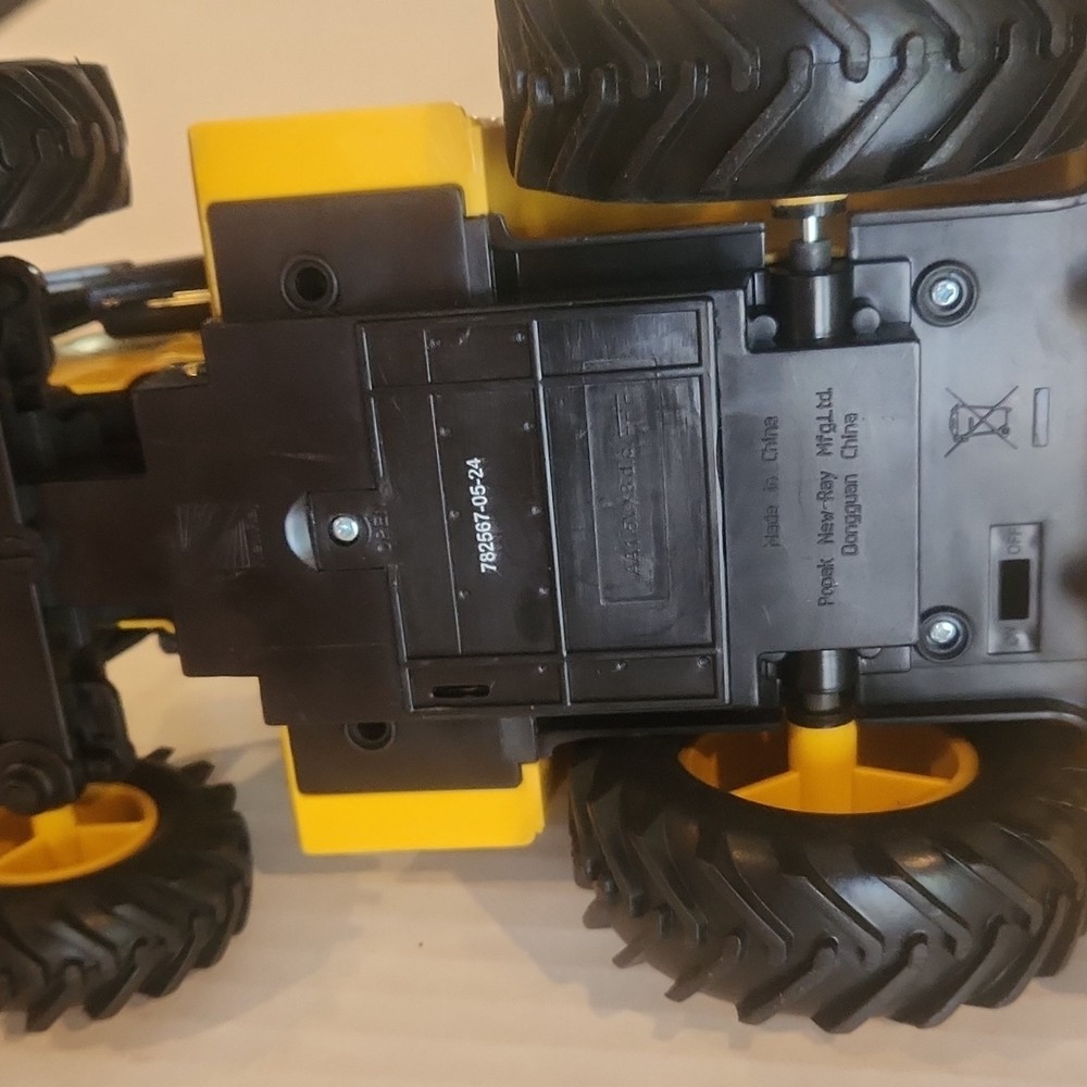 Volvo BL71 Backhoe Loader Plastic Toy Model Yellow Black