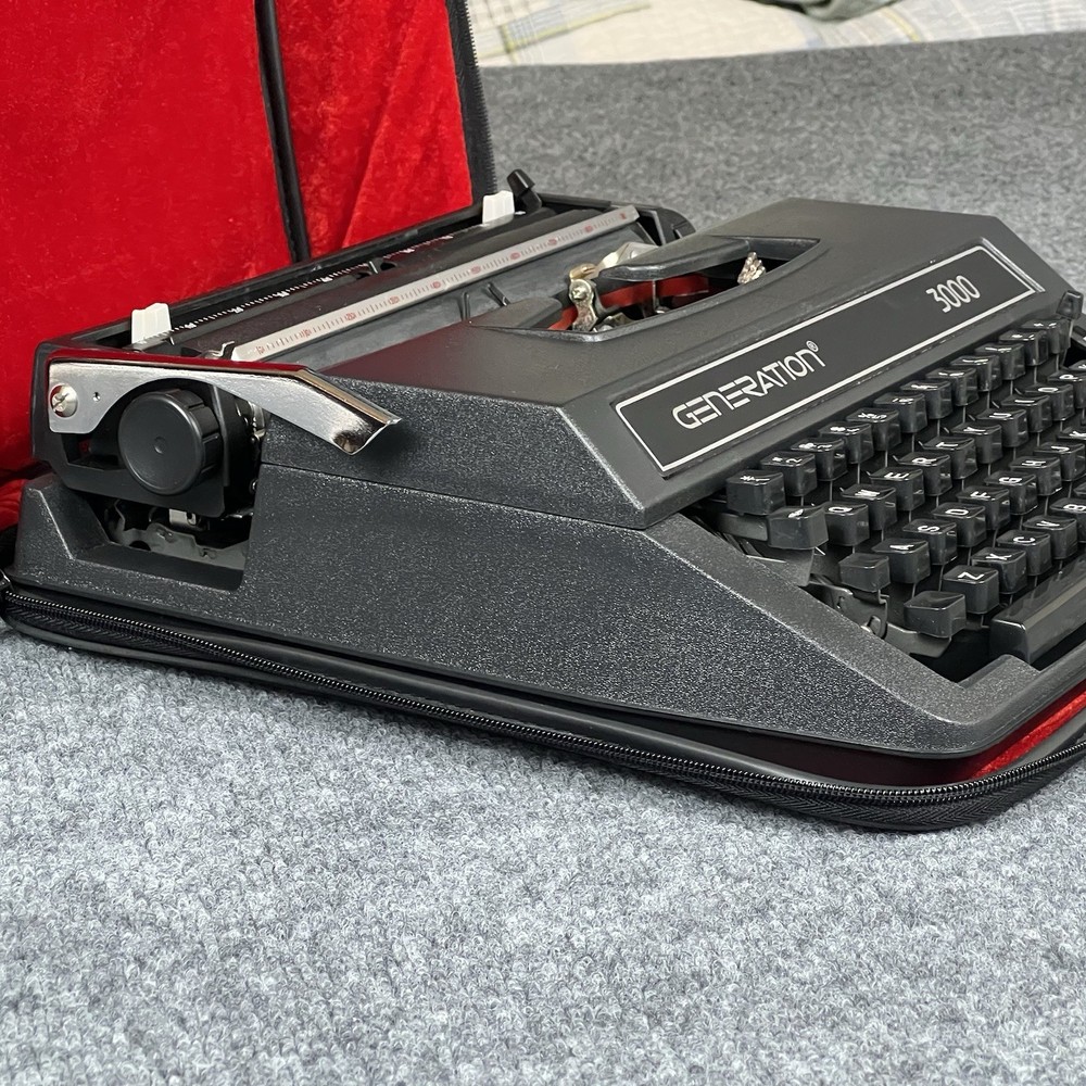 Generation 3000 Manual Typewriter with Case and Paperwork