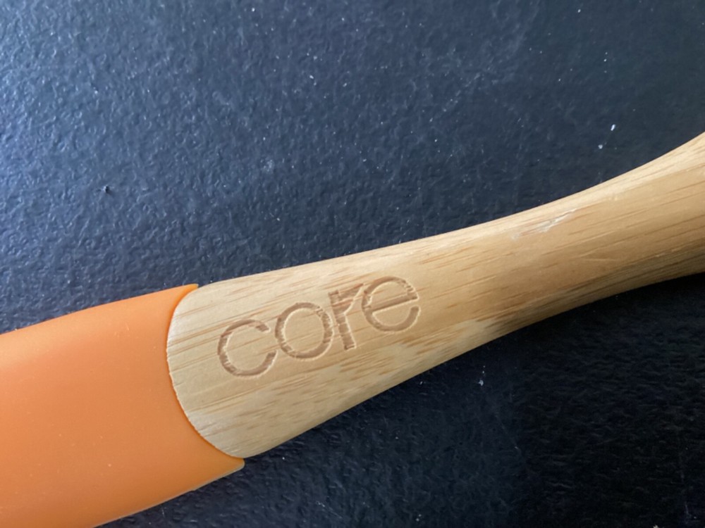 Wooden Spoon with orange rubber handle