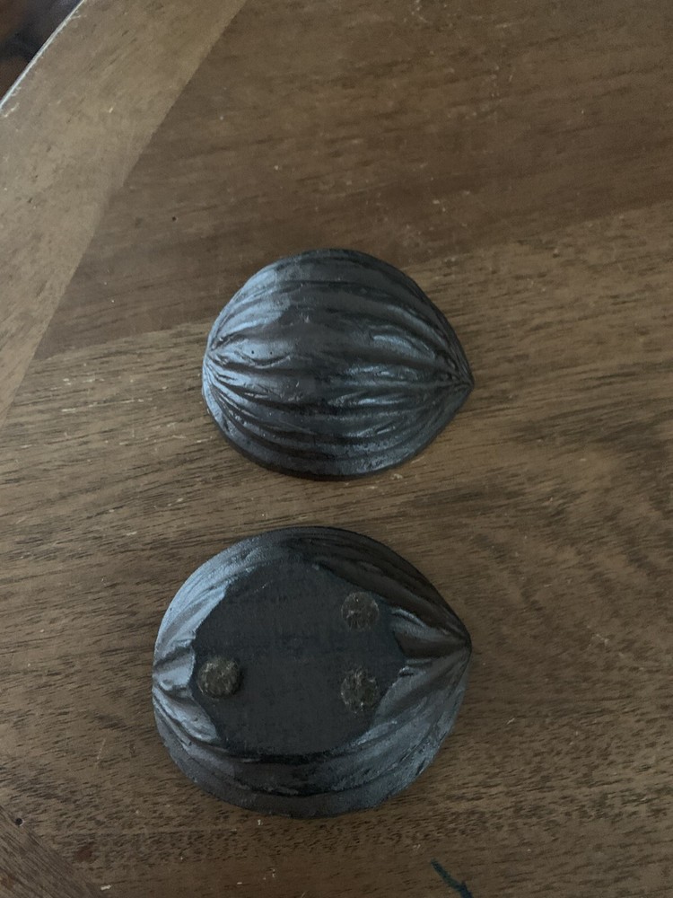 cast iron walnut shaped paper weight brown