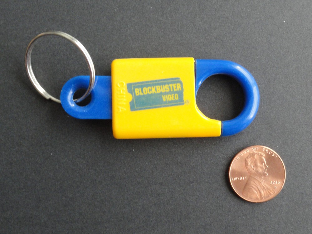 BLOCKBUSTER VIDEO PLASTIC KEYRING - NEVER USED -  EXCELLENT