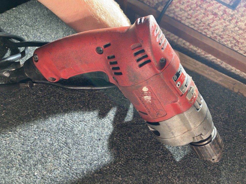 Milwaukee Electric Drill with Side Handle Attachment