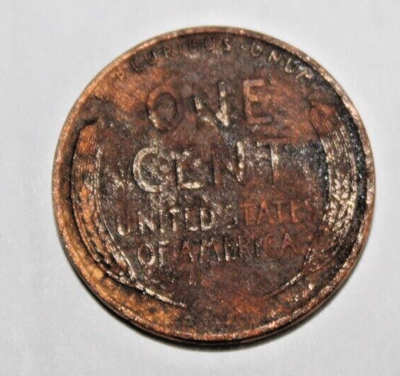 1937 penny with rim errors on front of coin