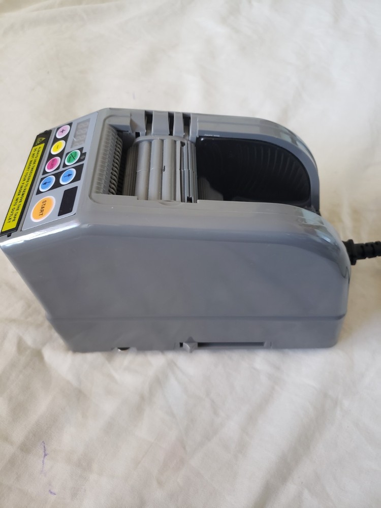 RT-7000 AUTOMATIC TAPE CUTTING MACHINE