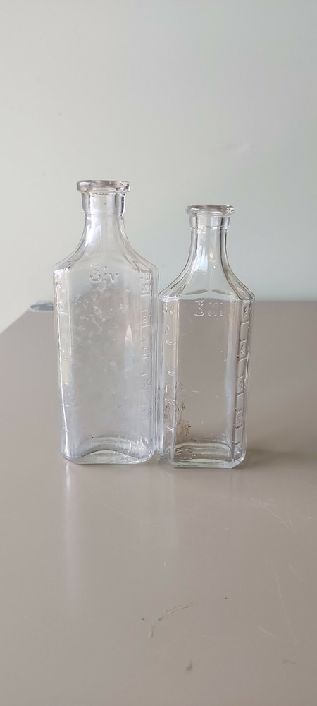 2 antique medicinal lyric bottles