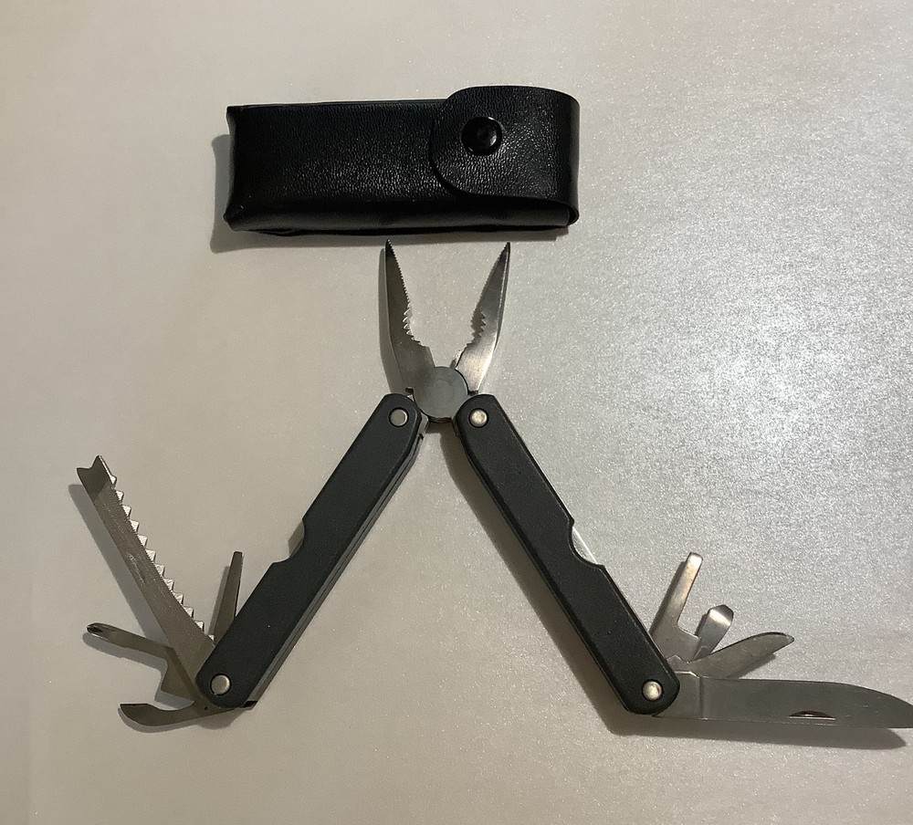 SALE $8 Multitool 8 Function Black Handle Not Branded In Case