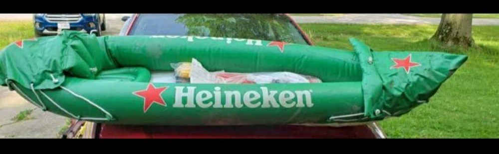 Heineken Inflatable Kayak Includes Oar,  Air Pump, Patch kit. Unused.