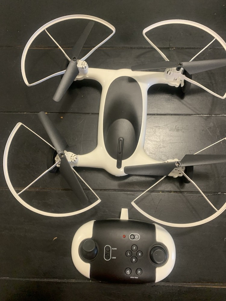 SHARPER IMAGE FLY + DRIVE 7" DRONE RECHARGEABLE DUAL FUNCTION 2.4GHZ LONG RANGE