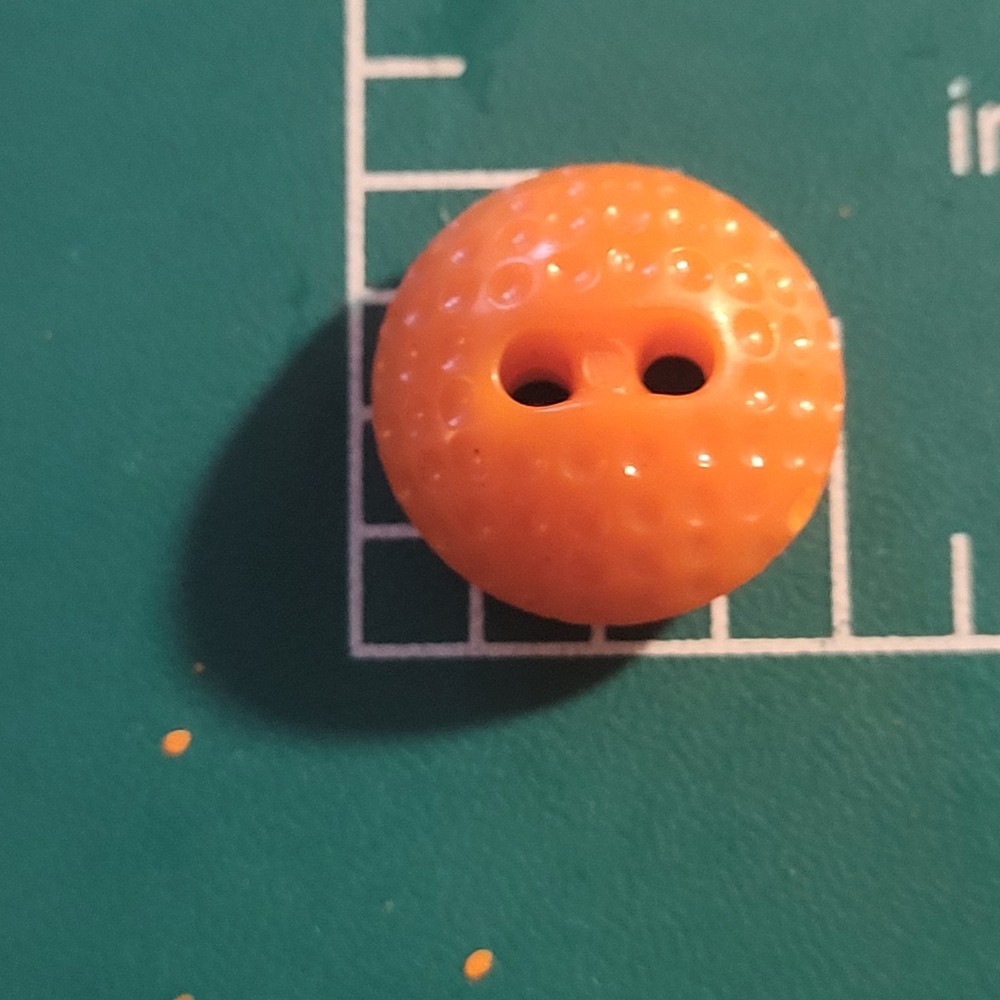 Colt # 35 button orange 1/2"  Golf pattern excellent condition  confirmed