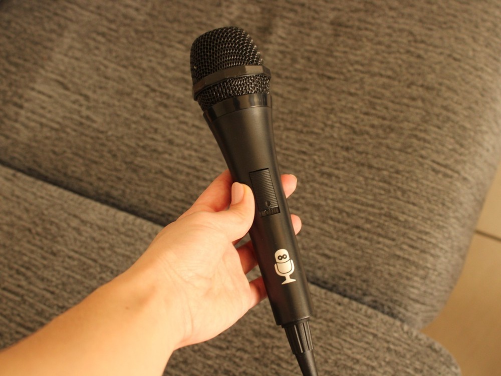 The Singing Machine Bluetooth CD+G Karaoke System, black with microphone
