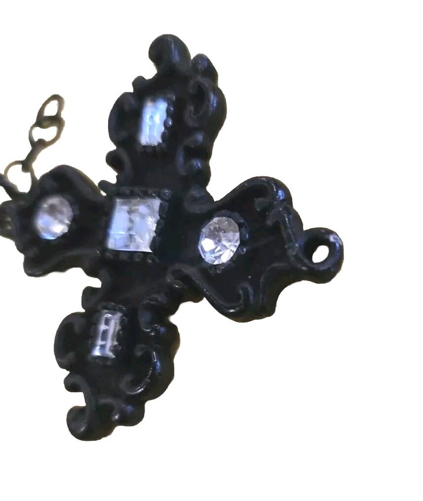 Crosslike Brown Pendant With Glass