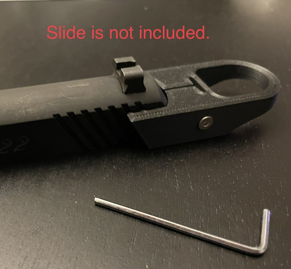 Colt Model 22 finger loop charger, slide racker.