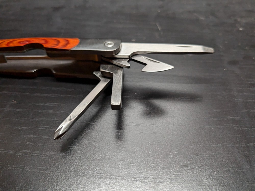 Elk Ridge-Multi Tool With Assorted Tools -pliers -knife-sockets- Bottle Opener