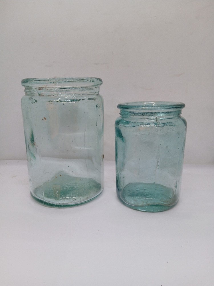 2 Old Different Size Glass Jars