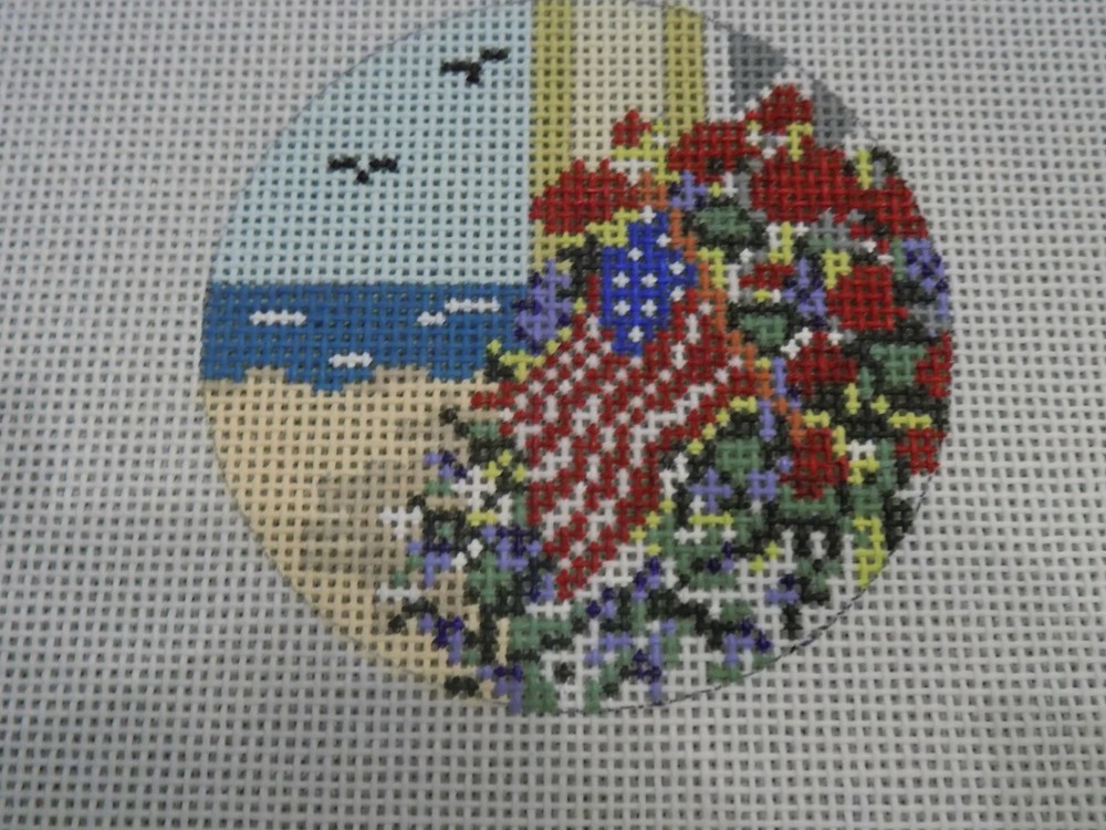 HAND PAINTED FLAG ON BEACH