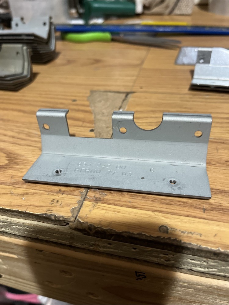 Igt coin in mounting bracket