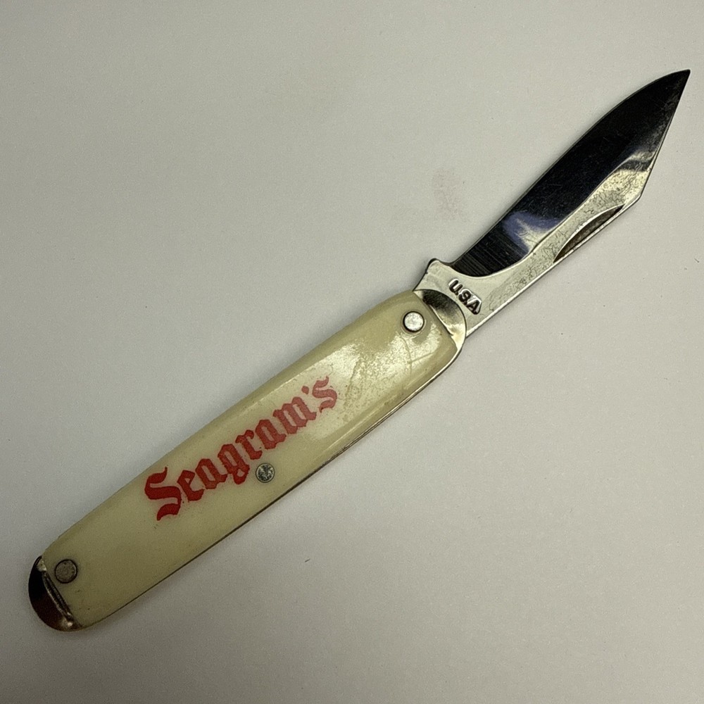 Vintage Seagram's Off-White Plastic Handle Folding Pocket Knife